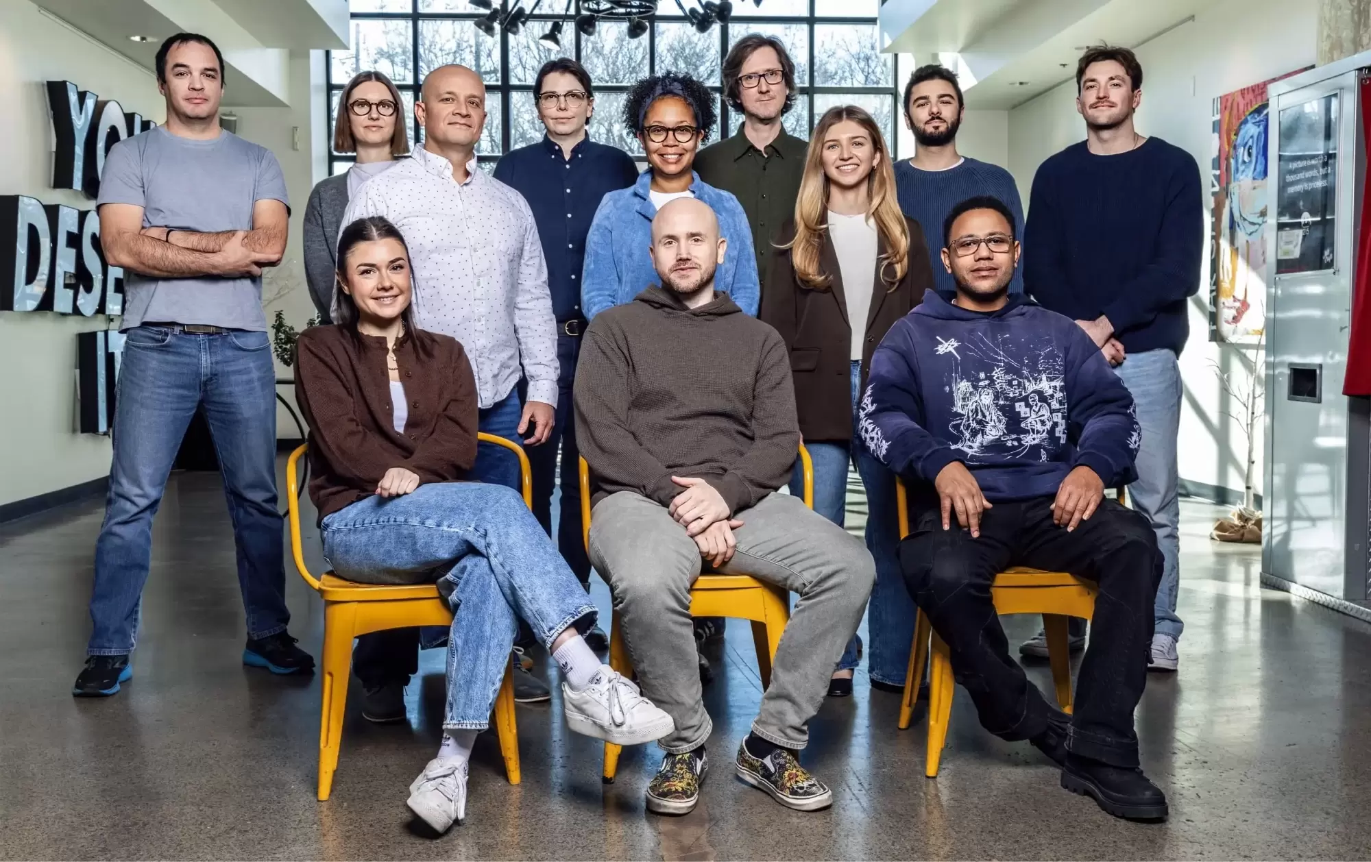 Brolik team group photo in office.